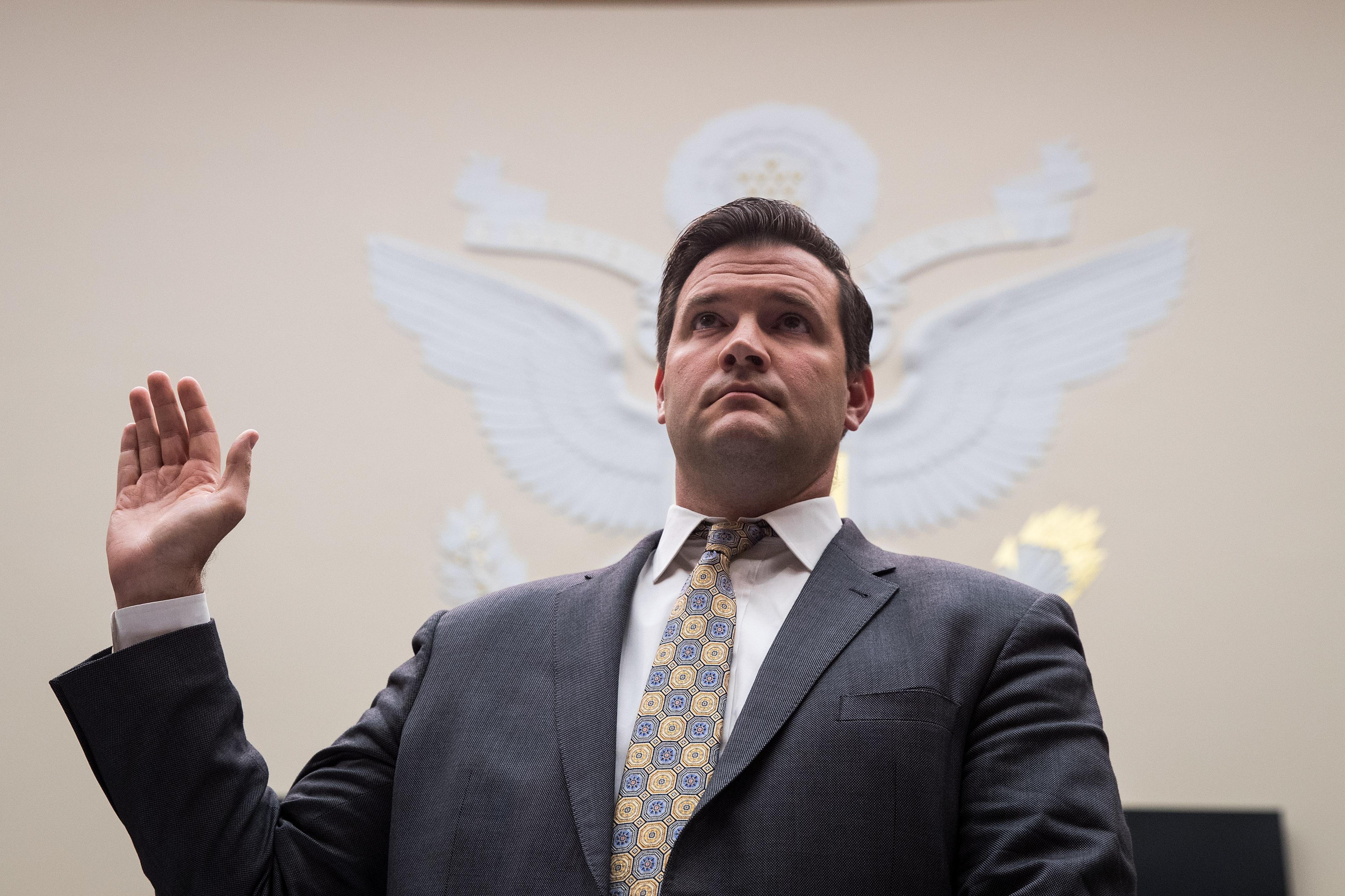 WASHINGTON, DC - OCTOBER 26: Scott Lloyd, director of the Office of Refugee Resettlement at the U.S. Department of Health and Human Services, is sworn-in during a House Judiciary Committee hearing concerning the oversight of the U.S. refugee admissions program, on Capitol Hill, October 26, 2017 in Washington, DC. The Trump administration is expected to set the fiscal year 2018 refugee ceiling at 45,000, down from the previous ceiling at 50,000. It would be the lowest refugee ceiling since Congress passed the Refugee Act of 1980. (Photo by Drew Angerer/Getty Images)