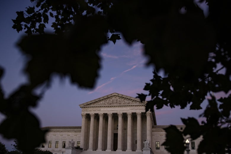 The Supreme Court building at sunset.