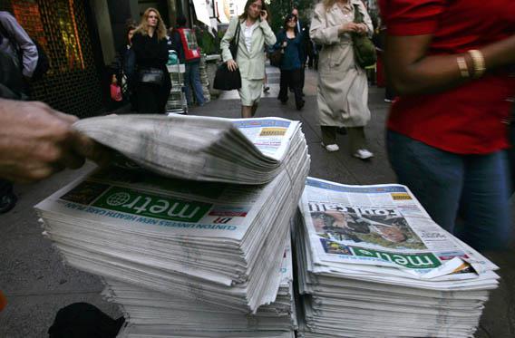A newspaper stack outside the Long Island Railroad in New York, Sept. 18, 2007.
