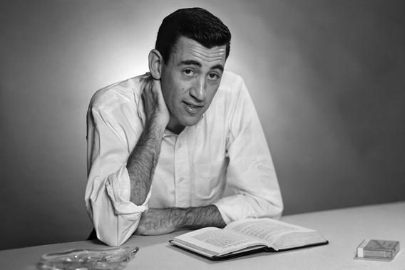 Author J.D. Salinger poses for a portrait as he reads from his classic American novel "The Catcher in the Rye".