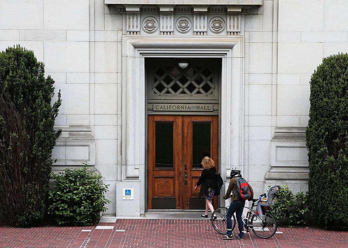 People enter California Hall on the UC Berkeley campus on May 22, 2014 in Berkeley, California. 