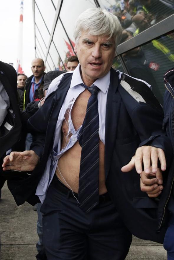 Air France executive shirt ripped off