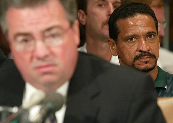 Juan Melendez (right), a former death row inmate who was exonerated, listens to testimony during a hearing before the Senate Judiciary Subcommittee on the Constitution on June 12, 2002, in Washington, D.C. 
