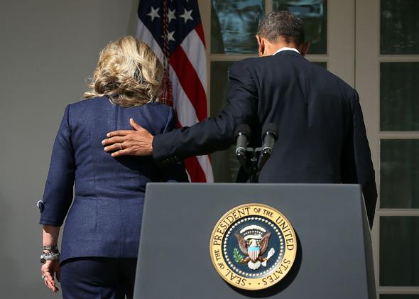 President Barack Obama and Hillary Clinton, then secretary of state, leave the Rose Garden after a statement at the White House in September 2012