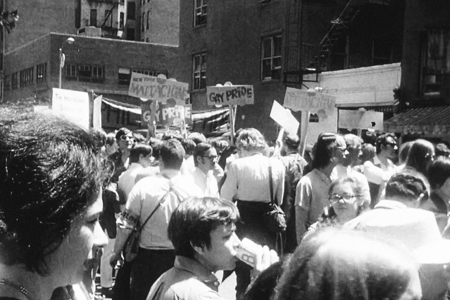 Black-and-white photo of a parade.