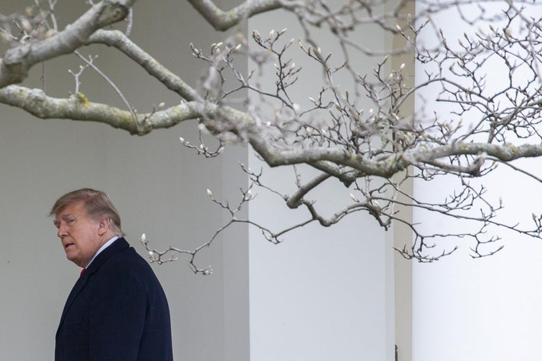 Donald Trump walks to the Oval Office while arriving back at the White House on December 31, 2020 in Washington, D.C.