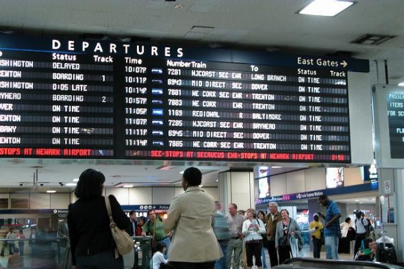 The old black departures board hangs in Penn Station's main concourse. 