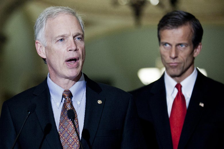 Sens. Ron Johnson (R-WI) and John Thune (R-SD) speak to the media after a weekly policy meeting at the Capitol on March 20, 2012 in Washington, D.C. 
