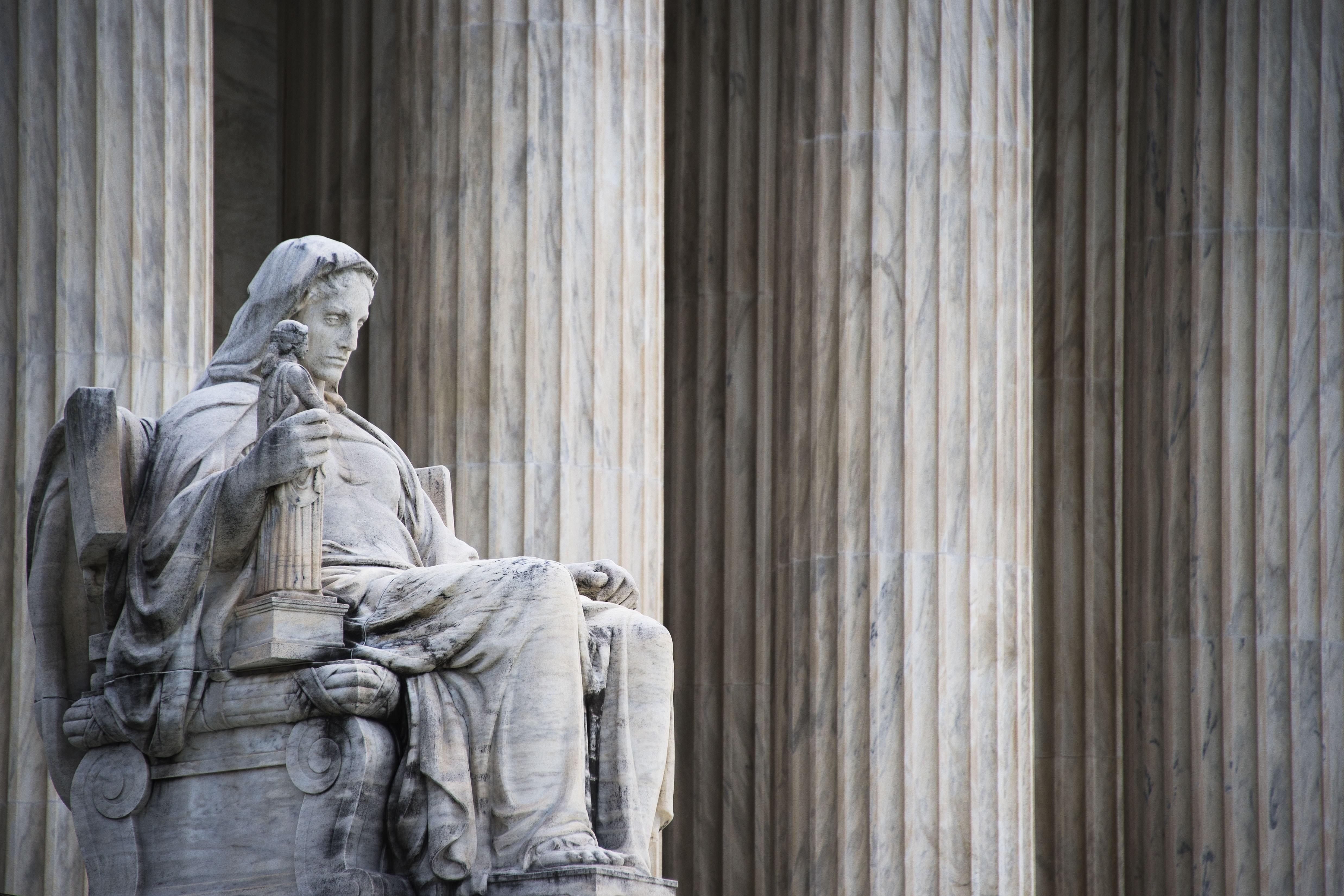 The statue of Contemplation of Justice at the United States Supreme court.