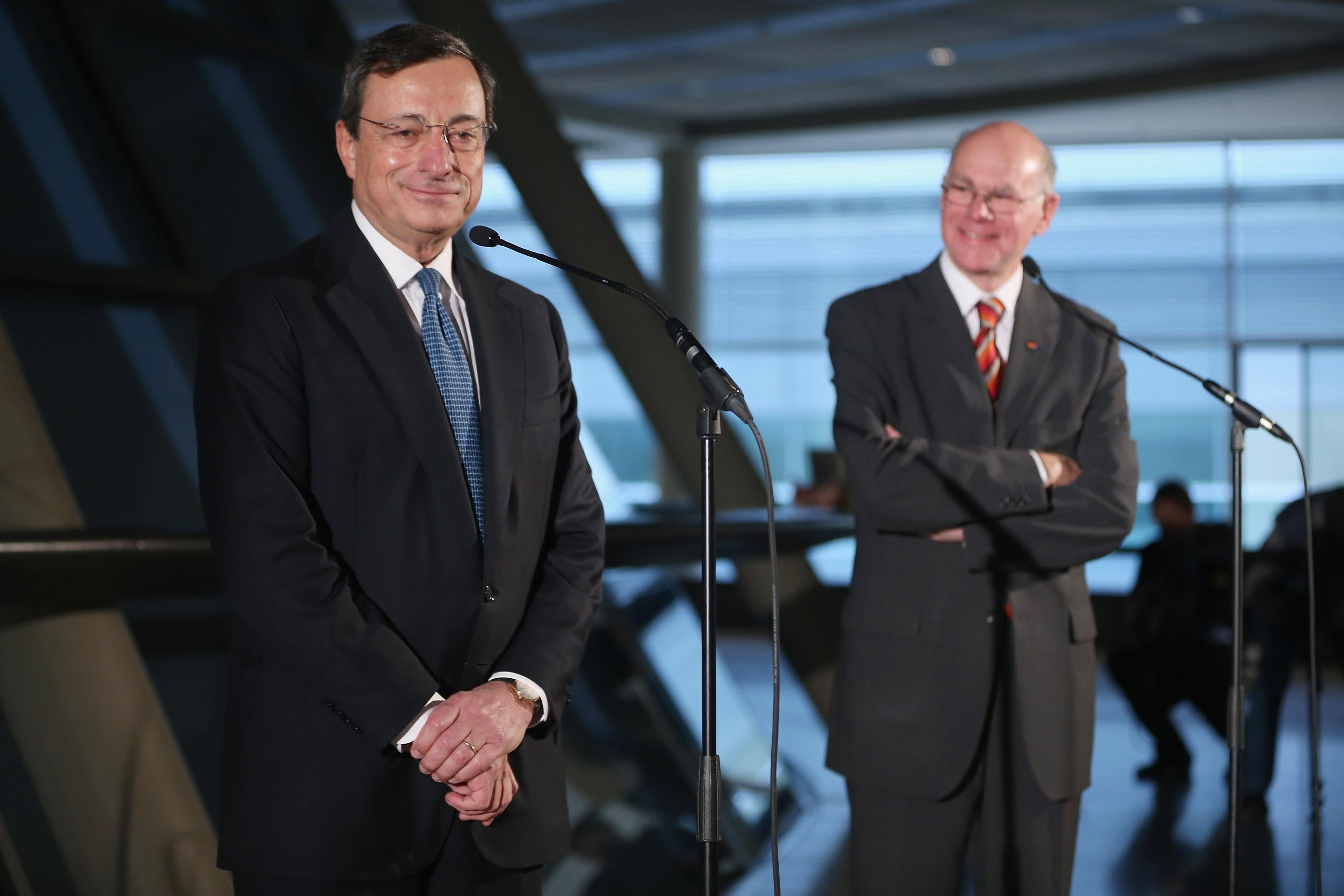 Mario Draghi, president of the European Central Bank, and Bundestag President Norbert Lammert speak to the media at the Bundestag after Draghi spoke to German parliamentarians on Oct. 24, 2012, in Berlin.