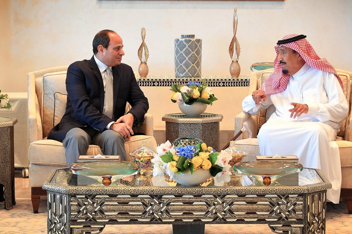 A handout picture released by the Egyptian Presidency on August 14, 2018, shows Saudi King Salman (R) receiving Egypt's President Abdel Fattah al-Sisi at the Neom site near Maqnah, northwestern Saudi Arabia. (Photo by - / Egyptian Presidency / AFP)        (Photo credit should read -/AFP via Getty Images)