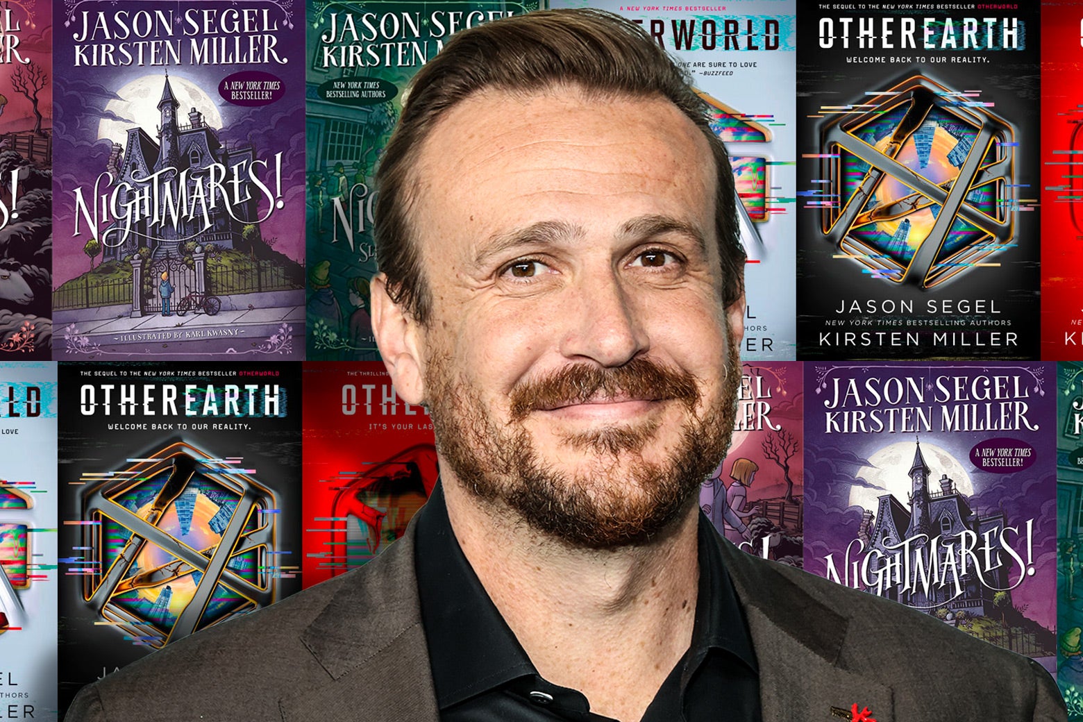 Jason Segel in front of a collage of the covers of books he's co-authored.