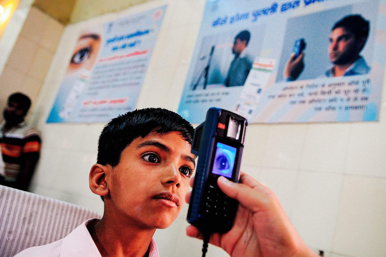A boy has his iris scanned for the Aadhaar identity system on April 12, 2013 in New Delhi.