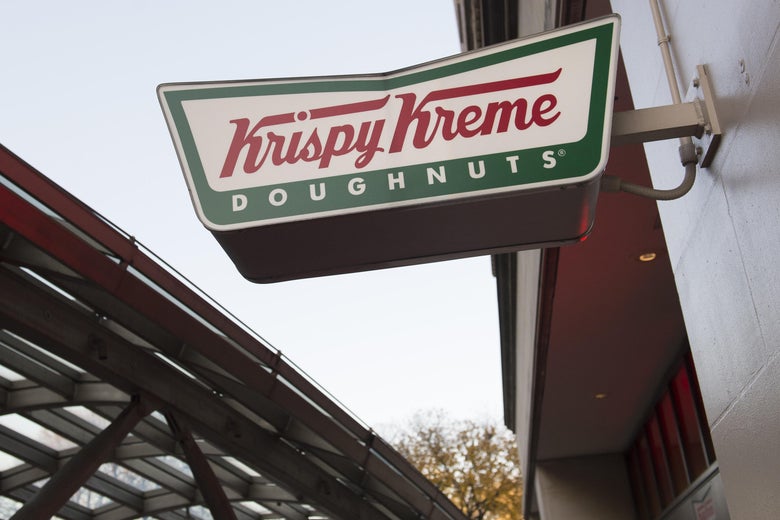 A sign for Krispy Kreme doughnuts