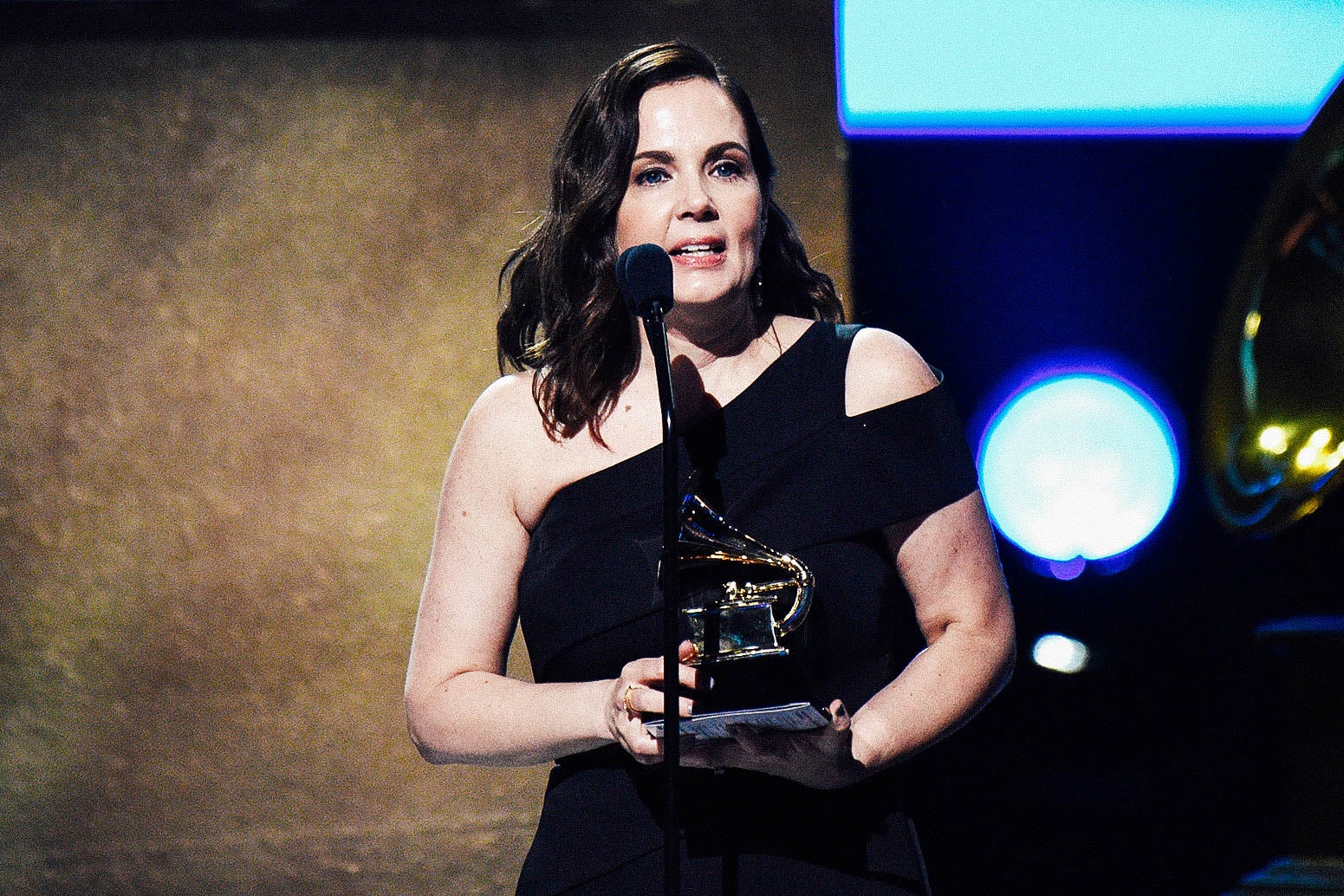 Singer-songwriter Lori McKenna accepts the award for Best Country Song onstage at the 59th Grammy Awards.