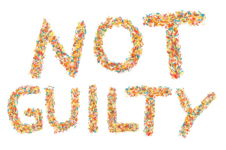 "Not Guilty" written in candy.