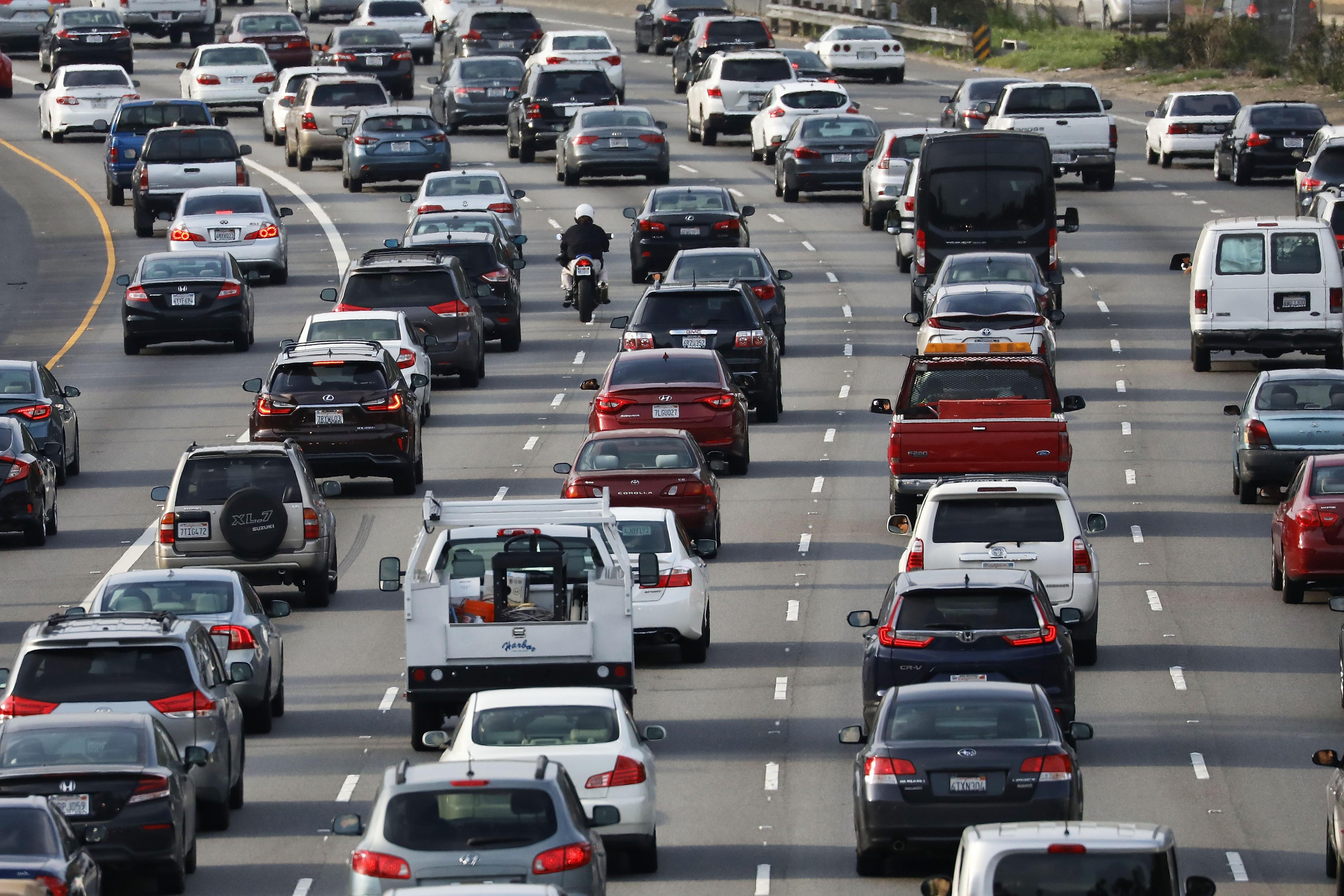 Cars sitting in traffic on an LA freeway