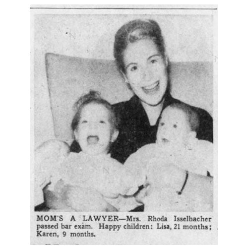 A newspaper clipping says "Mom's a lawyer" and features a photo of Rhoda with two daughters.