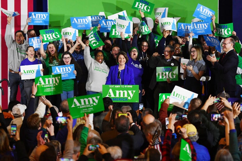 Amy Klobuchar surrounded by supporters