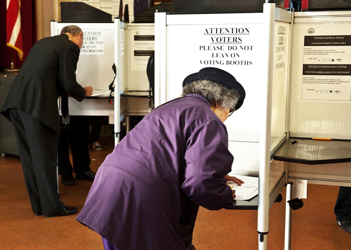 People fill their ballots at a polling station in Washington, D.C., on Nov. 6, 2012. 