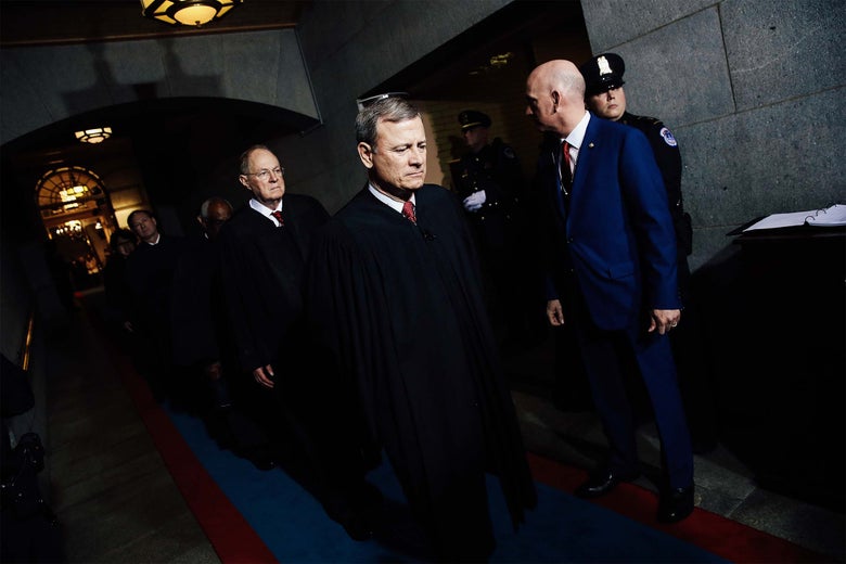 Supreme Court Chief Justice John Roberts and Justice Anthony Kennedy arrive at the U.S. Capitol on Jan. 20, 2017, in Washington, for the inauguration of Donald Trump.