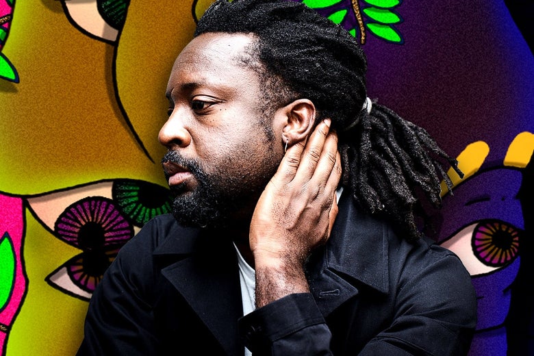 Marlon James resting his head on his left hand.