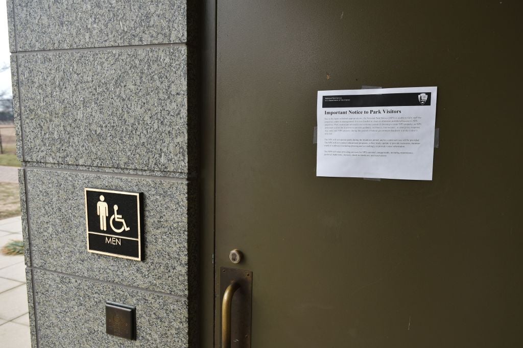 A notice about the government shutdown on the door of the men's bathroom at the Martin Luther King Jr. Memorial in Washington, D.C.