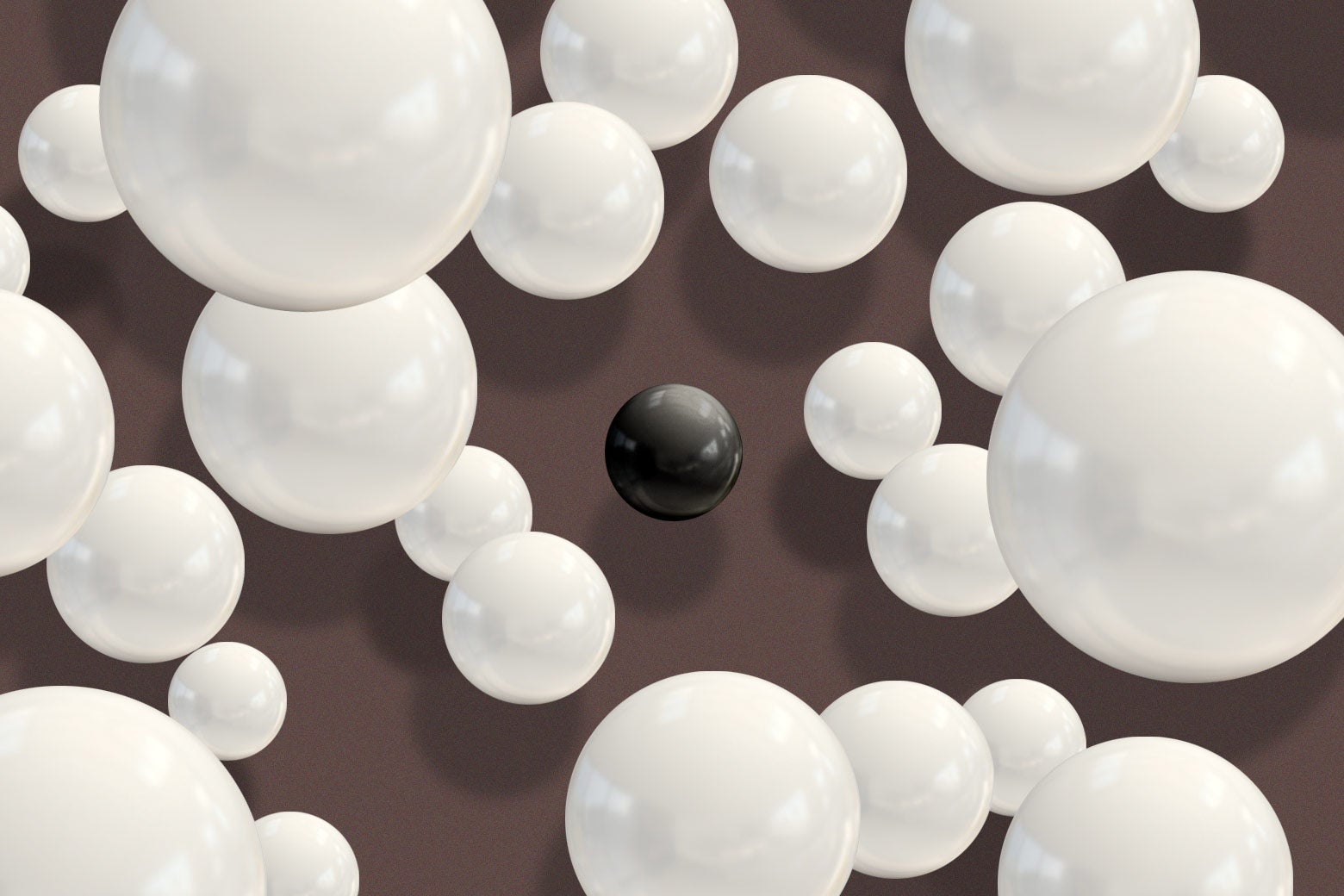 An illustration of several white marbles, and a single black marble at the center. 