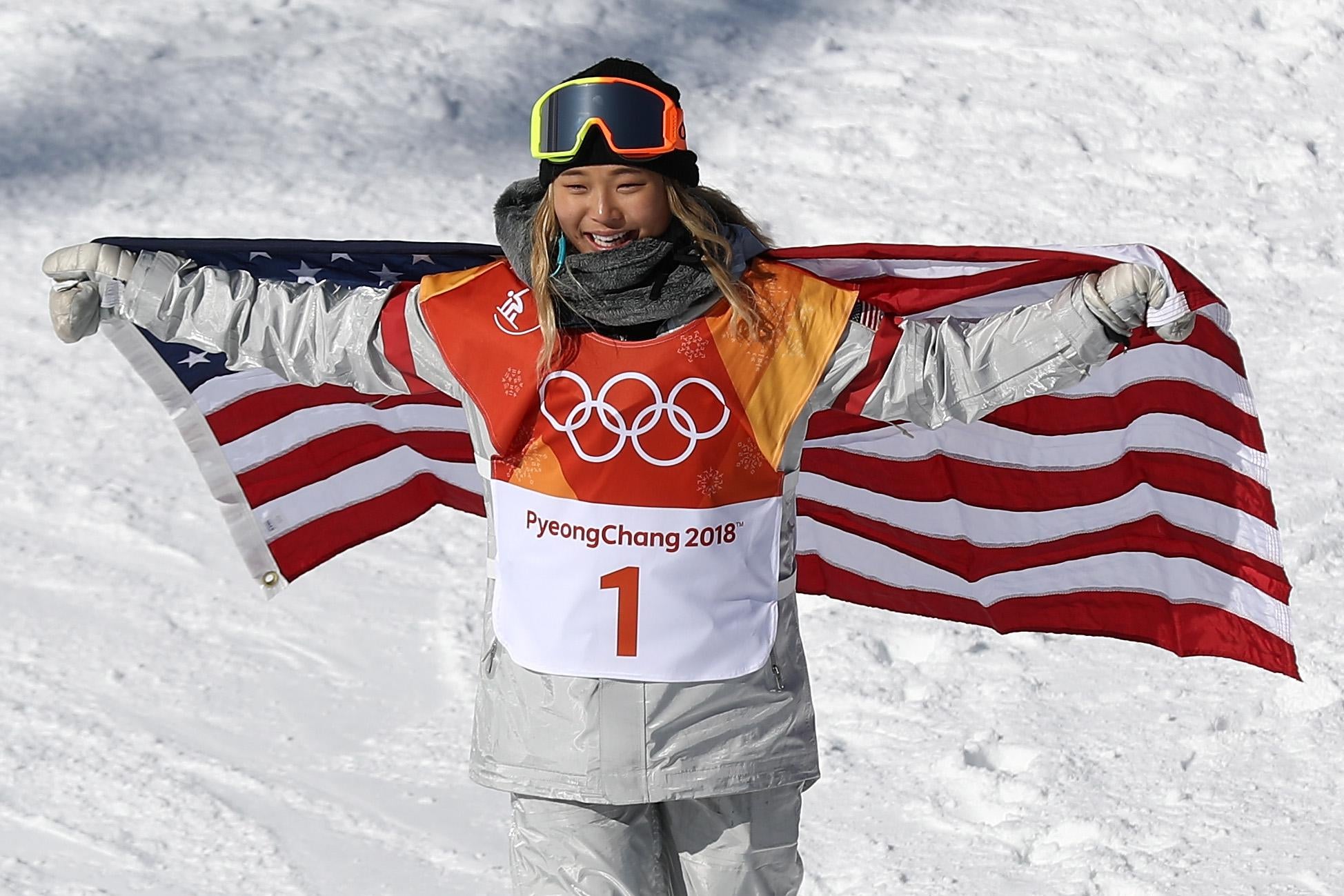 PYEONGCHANG-GUN, SOUTH KOREA - FEBRUARY 13:  Gold medalist Chloe Kim of the United States celebrates winning the Snowboard Ladies' Halfpipe Final on day four of the PyeongChang 2018 Winter Olympic Games at Phoenix Snow Park on February 13, 2018 in Pyeongchang-gun, South Korea.  (Photo by Clive Rose/Getty Images)