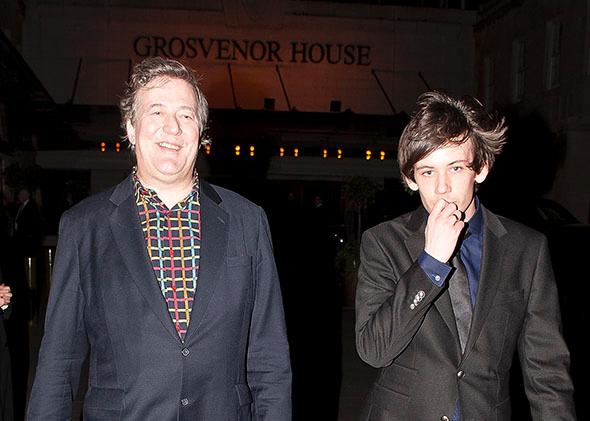 Stephen Fry and Elliott Spencer in London on March 30, 2014.