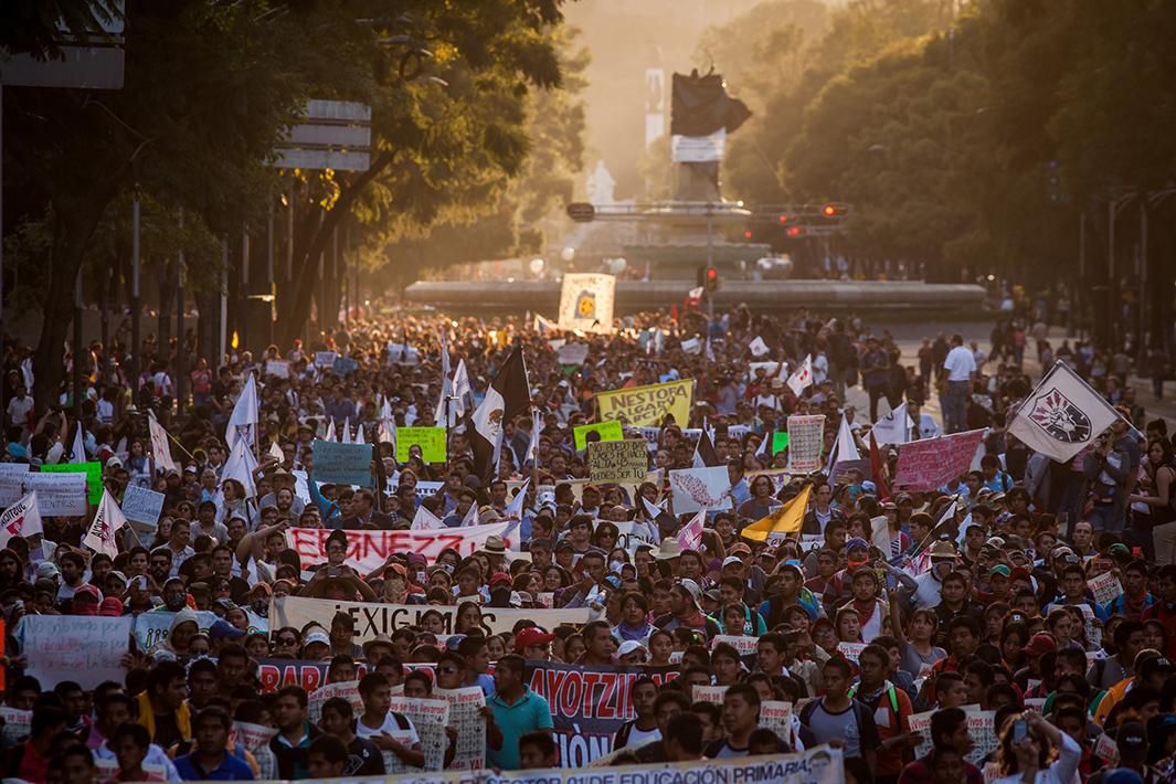 Demonstrators in Mexico City attend the third massive protest related to the case on November 5. Several universities in the country called a strike for 72 hours.  