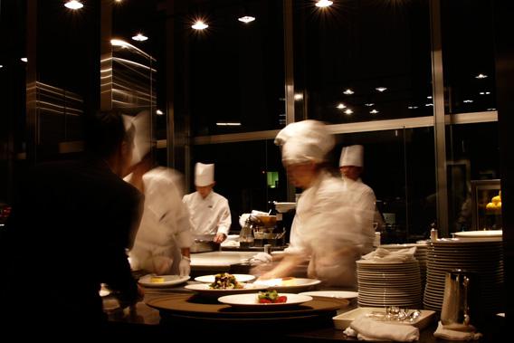 Chefs in a restaurant kitchen.