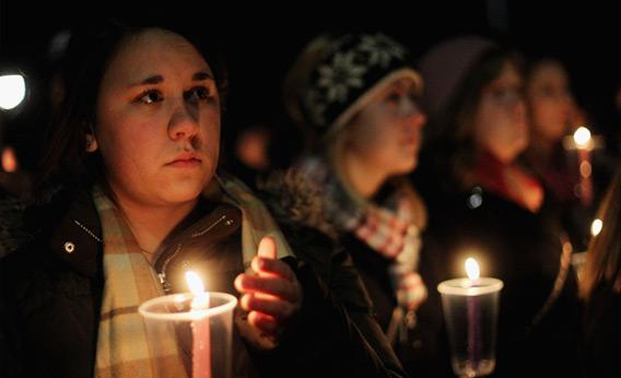 Penn State students at candle light vigil.