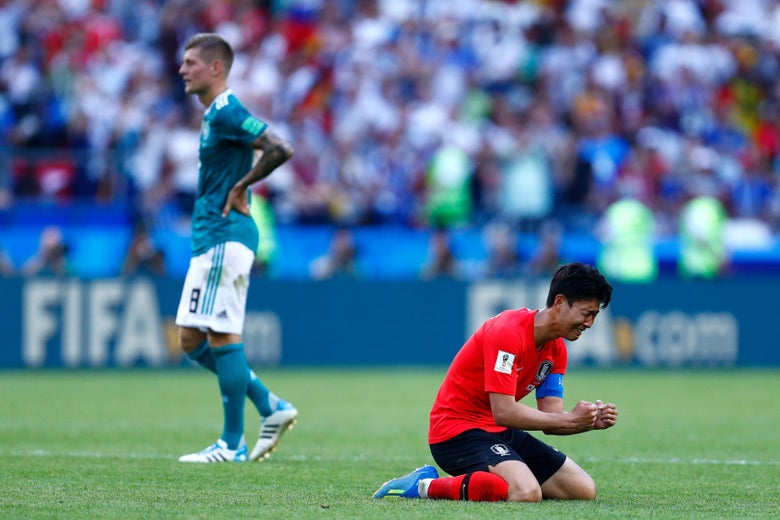 South Korea's forward Son Heung-min (R) reacts after his team did not qualify following the Russia 2018 World Cup Group F football match between South Korea and Germany at the Kazan Arena in Kazan on June 27, 2018. (Photo by BENJAMIN CREMEL / AFP) / RESTRICTED TO EDITORIAL USE - NO MOBILE PUSH ALERTS/DOWNLOADS        (Photo credit should read BENJAMIN CREMEL/AFP/Getty Images)