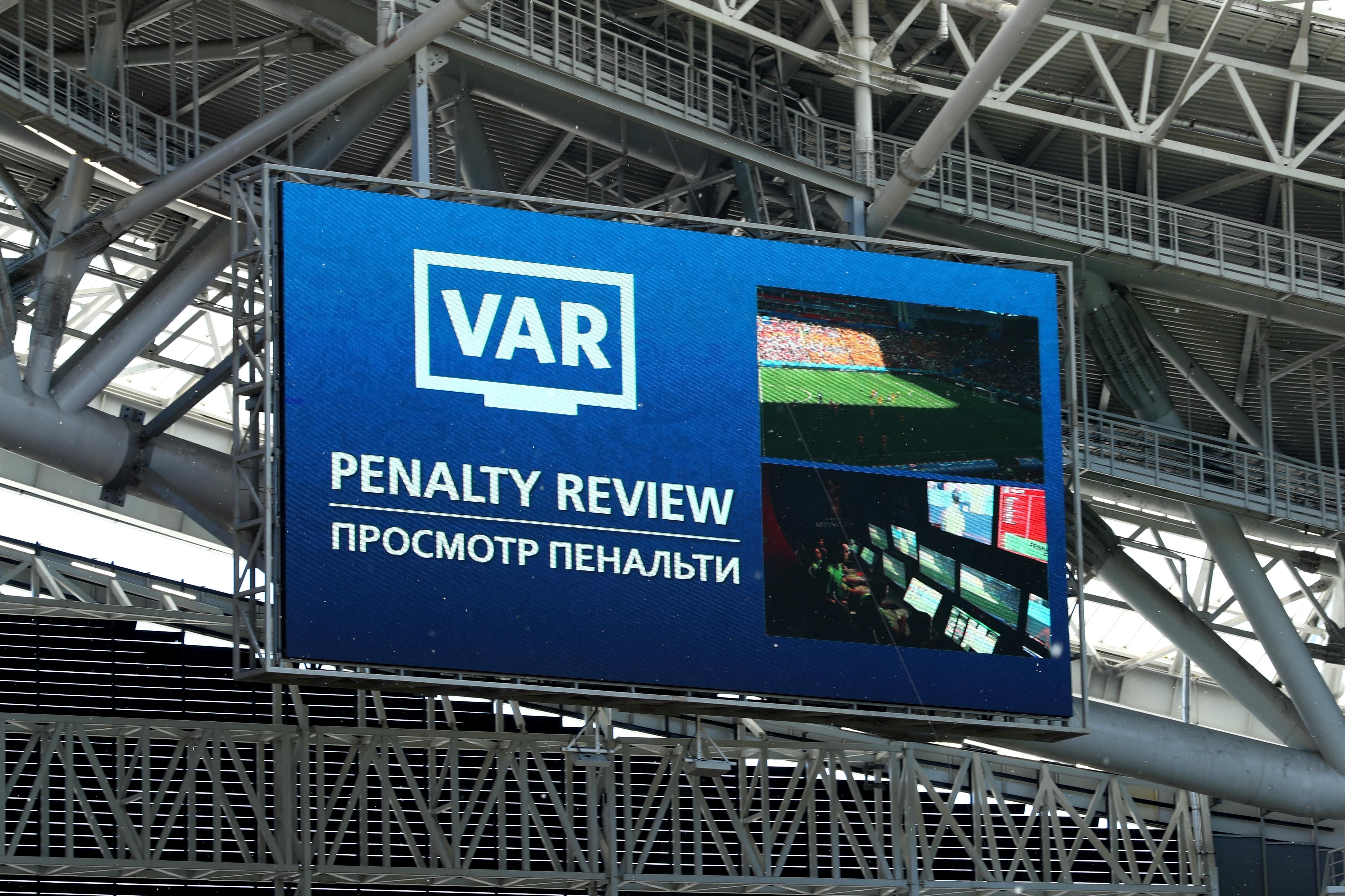 KAZAN, RUSSIA - JUNE 16:  The LED screen shows VAR reviewing a penalty decision during the 2018 FIFA World Cup Russia group C match between France and Australia at Kazan Arena on June 16, 2018 in Kazan, Russia.  (Photo by Catherine Ivill/Getty Images)