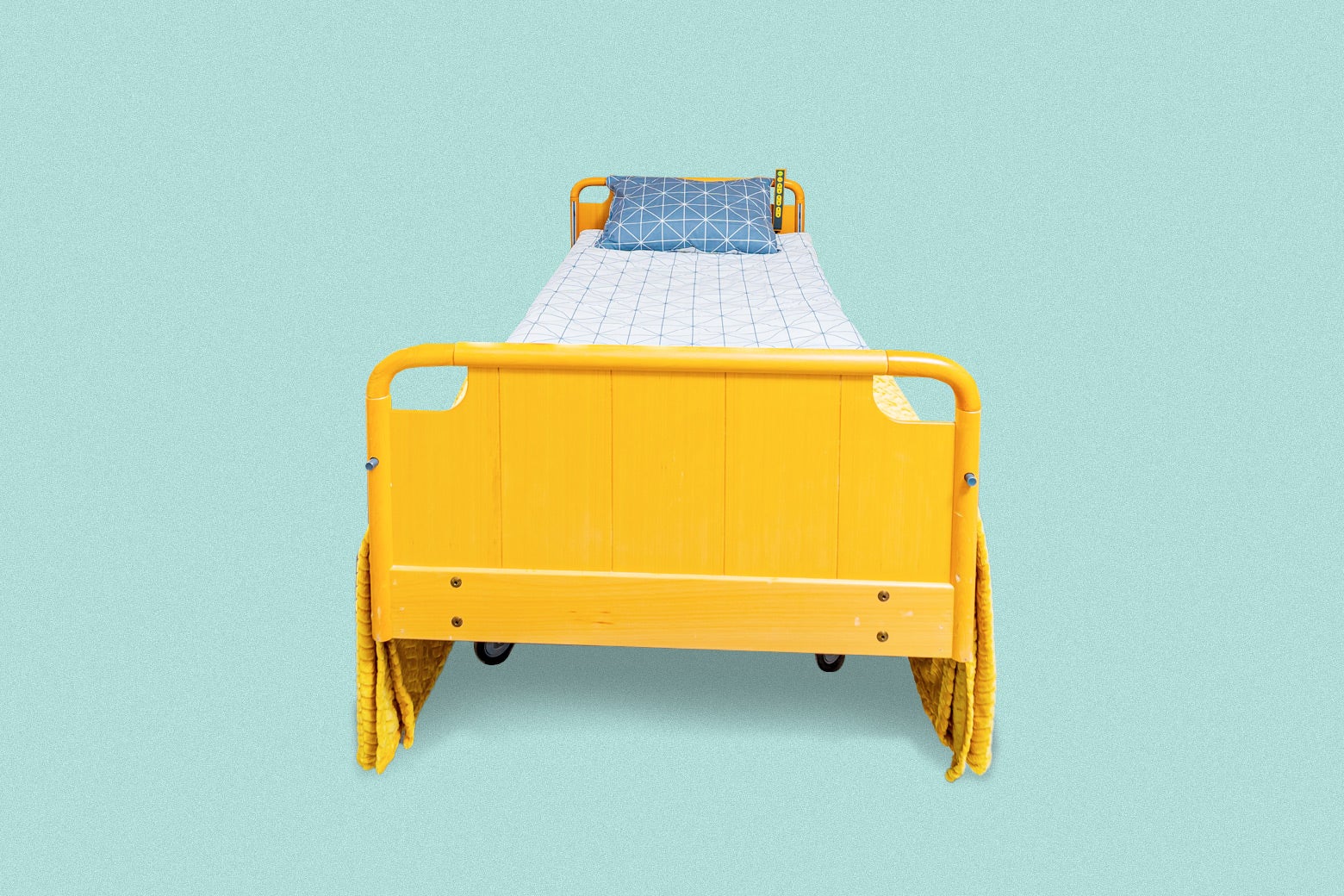 A yellow metal bed.