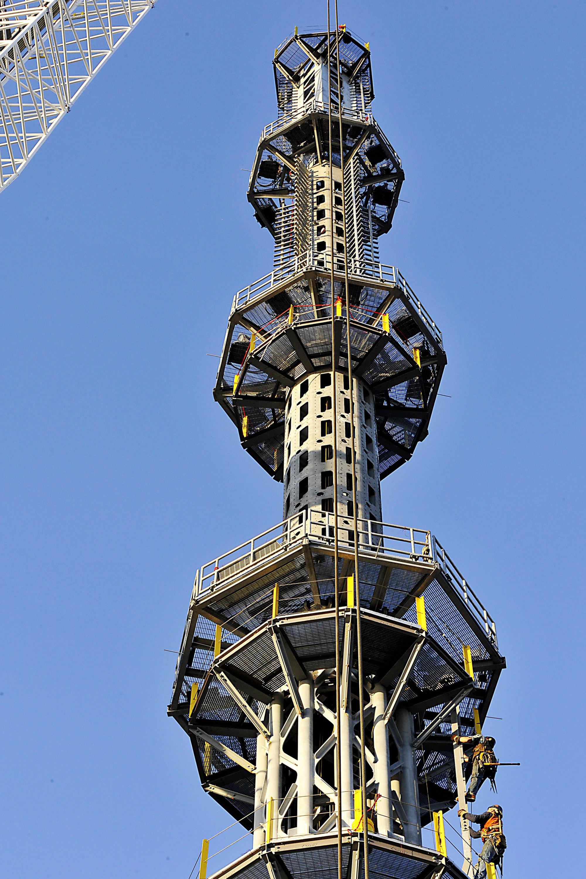 The final section of spire is installed atop One World Trade Center