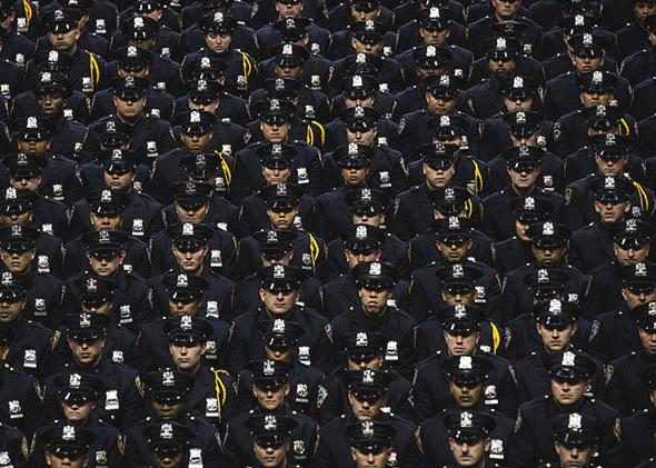 New York City Police Academy cadets attend their graduation ceremony at the Barclays Center on July 2, 2013 in Brooklyn. 