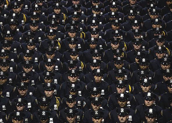 New York City Police Academy cadets attend their graduation ceremony at the Barclays Center on July 2, 2013 in Brooklyn.