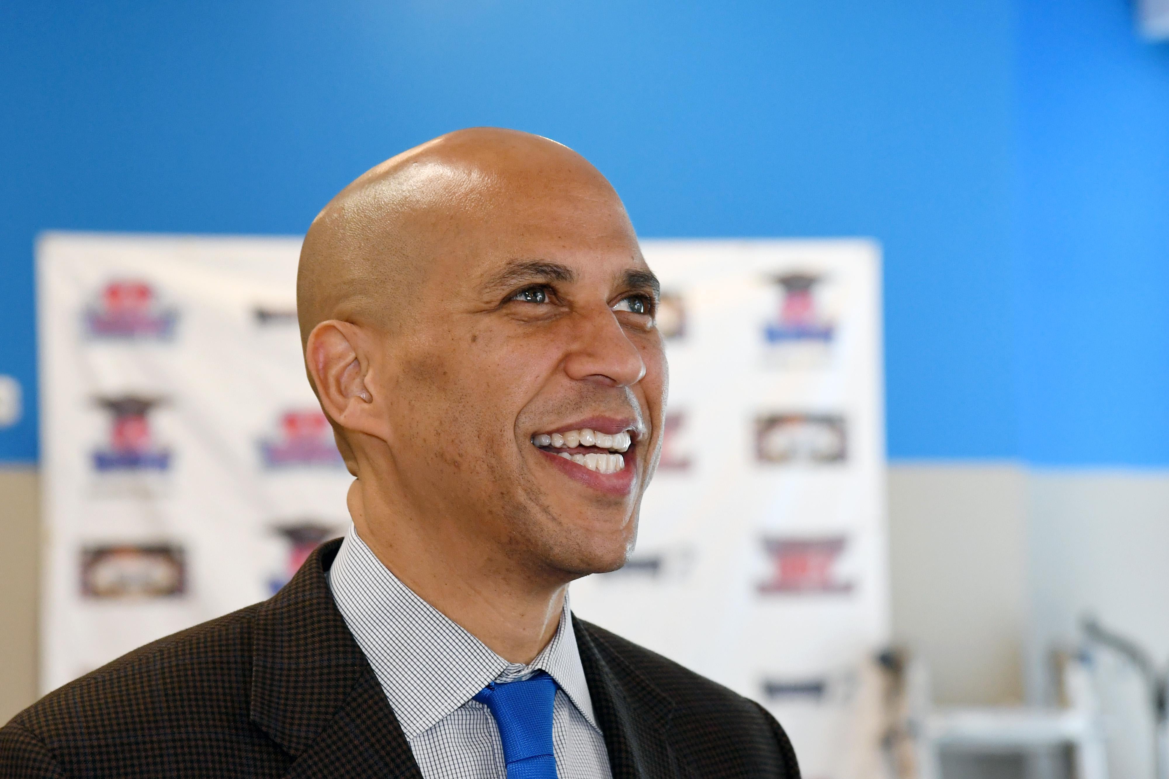 Cory Booker smiling.
