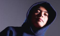 Boy in a hooded sweatshirt.