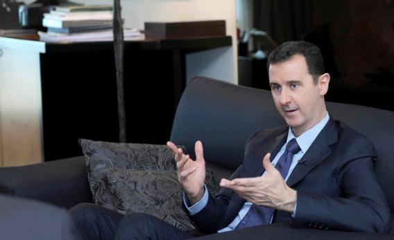 Syria's President Bashar al-Assad speaks during an interview with a Russian newspaper in Damascus.