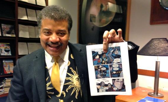 Neil deGrasse Tyson points to his likeness in DC Comics' latest Superman story, Action Comics #14.