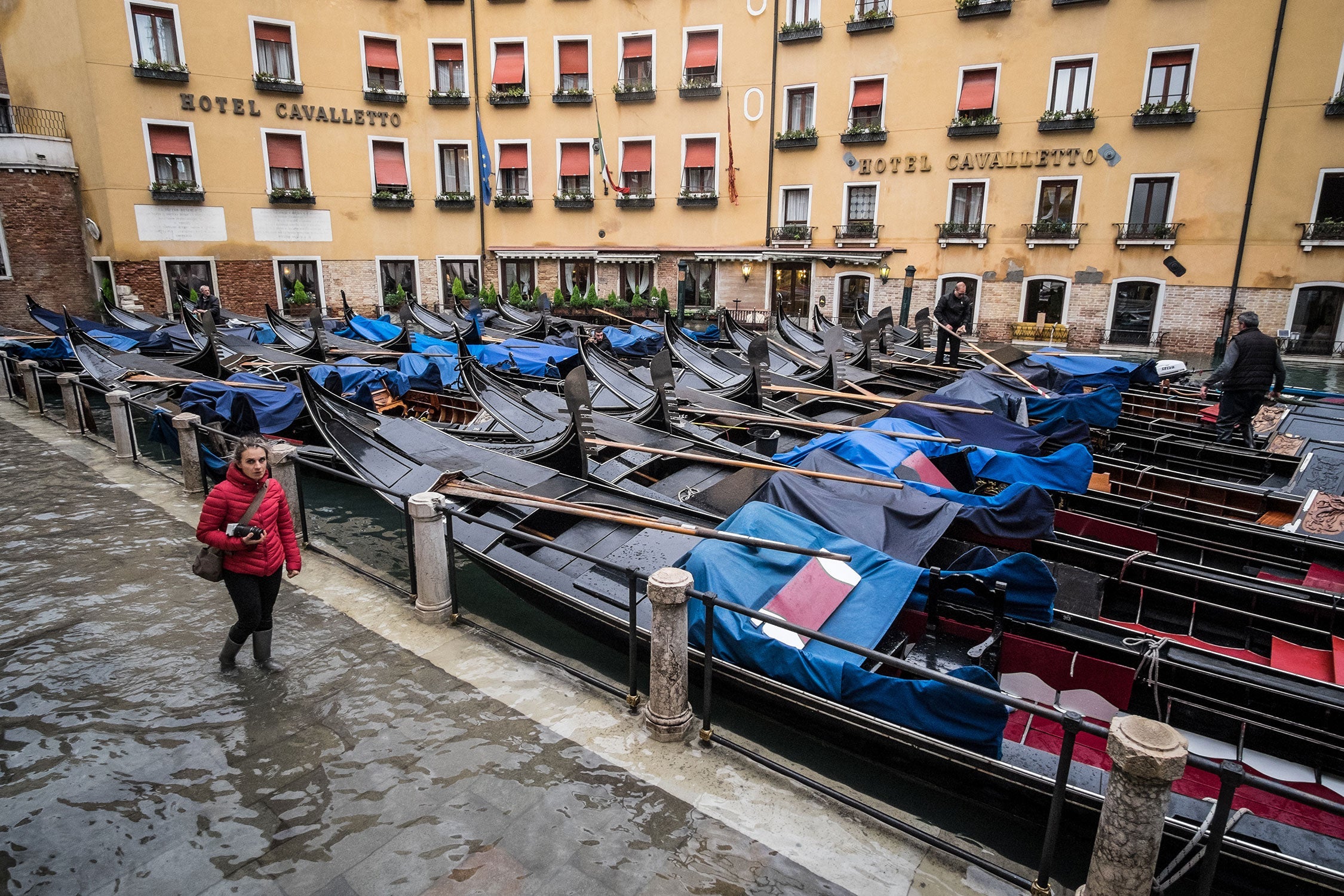 St. Mark’s Square, tens of gondolas are moored during an exceptional high tide flooding the city.