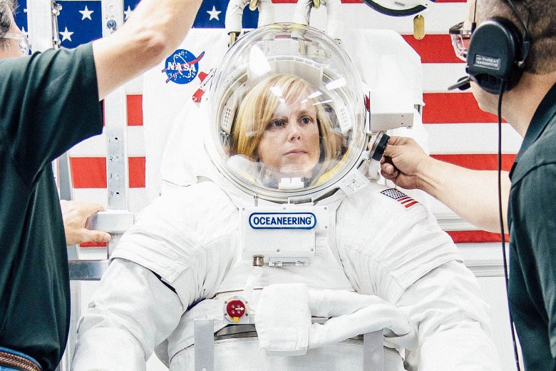 A woman in a spacesuit.