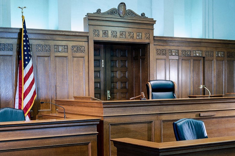 An empty judge’s bench.