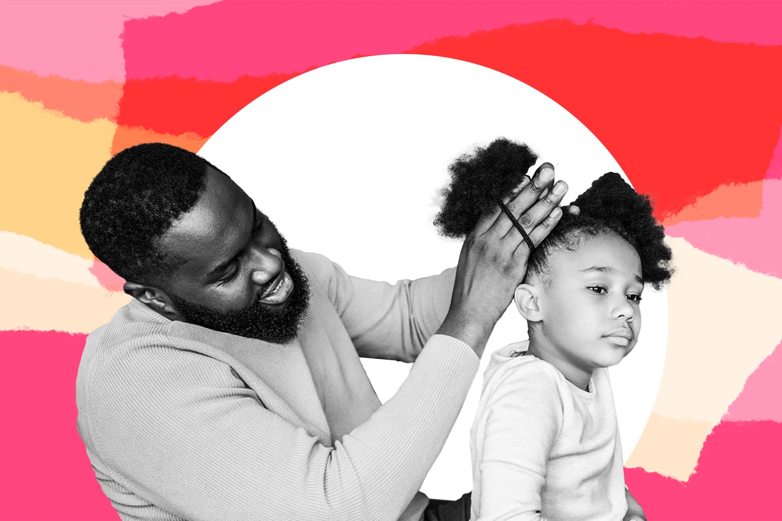 A father cares for his daughter's hair.