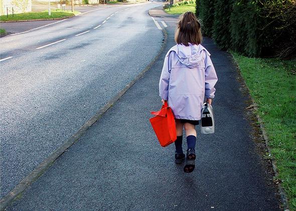Child walking to school on her own