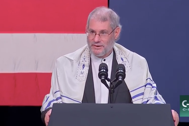 Messianic Jewish Rabbi Loren Jacobs of Synagogue Shema Yisrael offering an invocation at a campaign event for Vice President Mike Pence.
