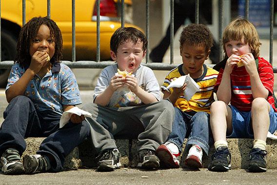 Children eat free Oscar Meyer Wiener hot dogs in Union Square at a kickoff event announcing the Oscar Meyer "Oh I Wish" contest May 11, 2004 in New York City.